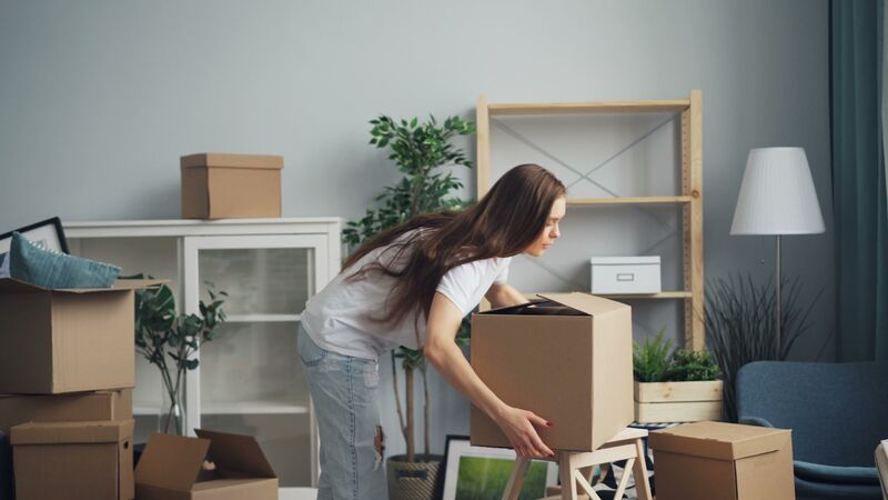 Packed boxes stacked in an emptied office.