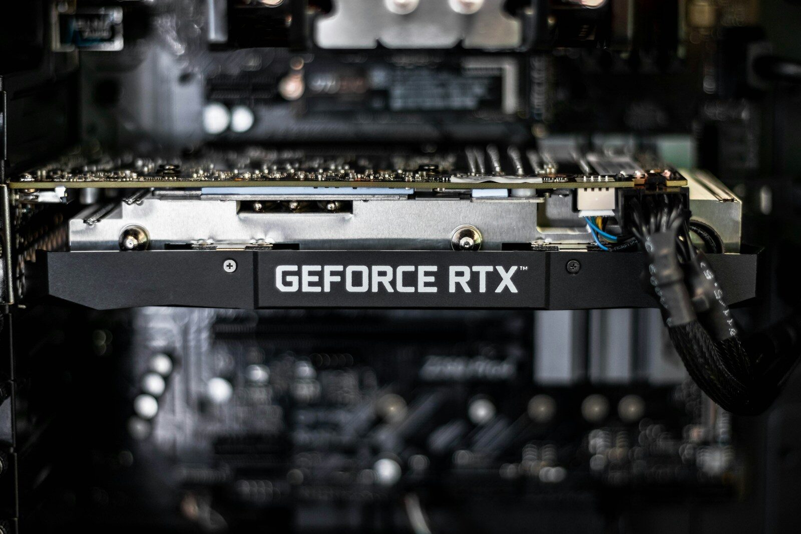 A GeForce RTX graphics card photographed in close focus