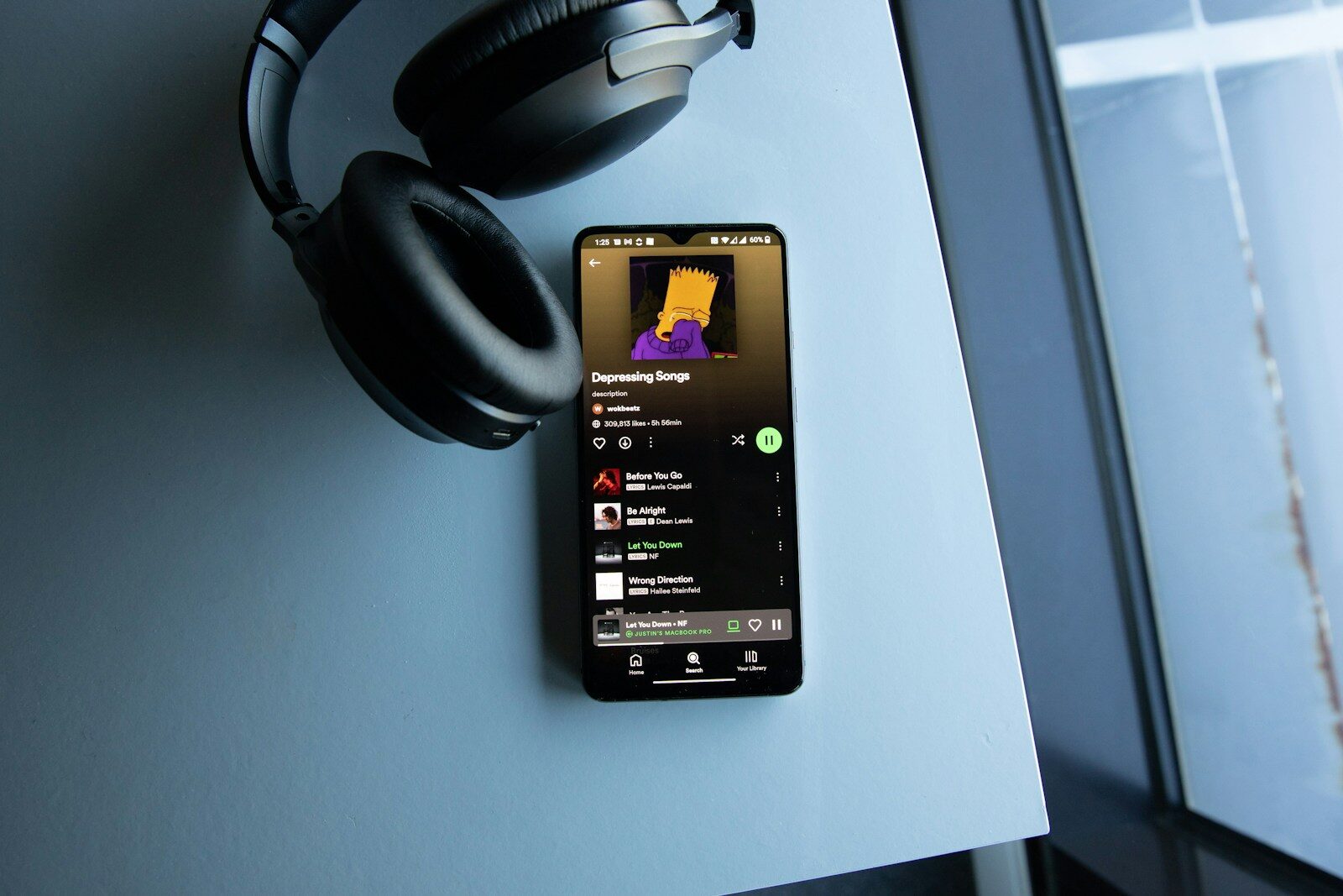 A Spotify playlist open on a phone screen