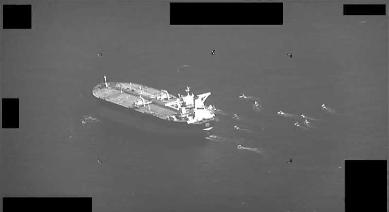 A merchant vessel under way in the Gulf, seen from the air.