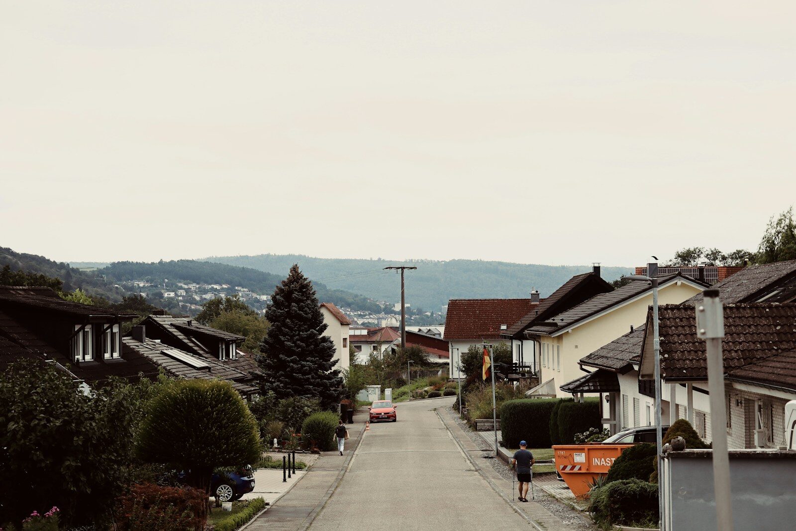 A residential street of suburban houses.