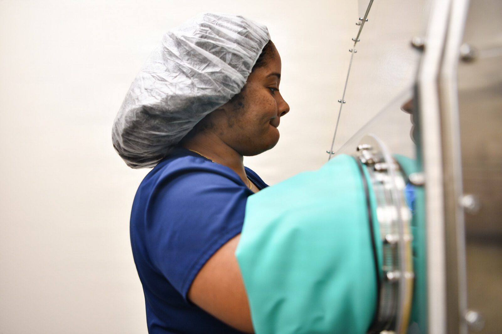 A pharmacy technician at work in a military treatment facility.