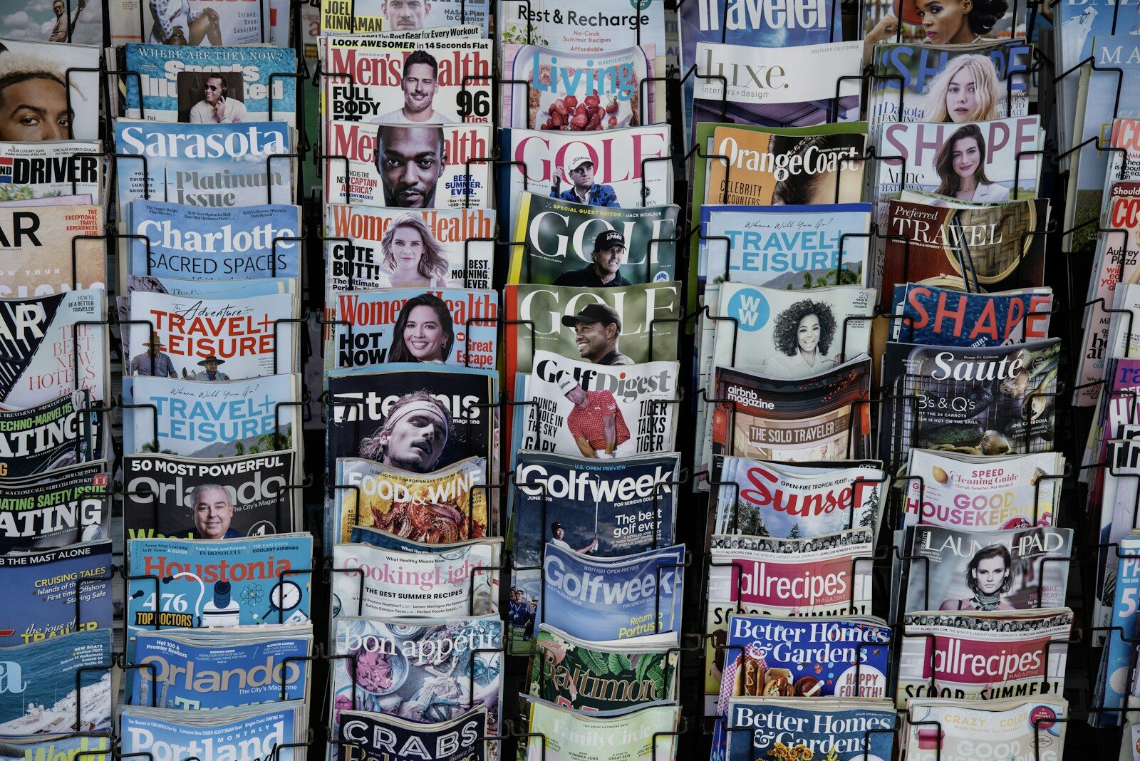 A stack of printed trade newspapers piled on top of each other